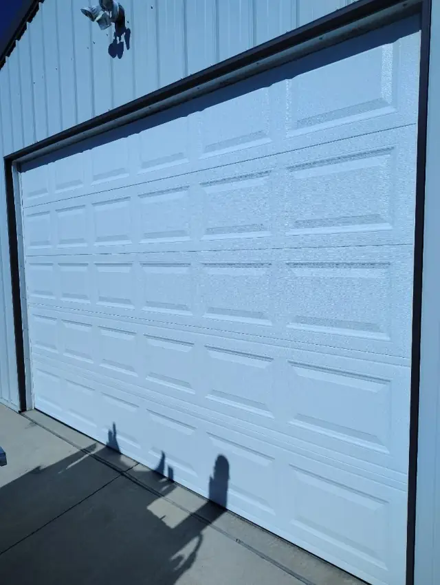 Broken Garage Door Panel: Repair or Replace?